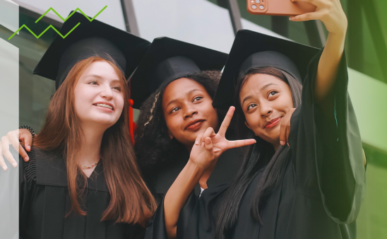 Three students smile for a selfie.