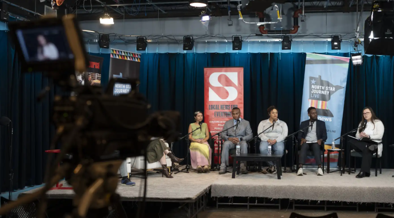 Camera shot of panel discussion during live MPR News